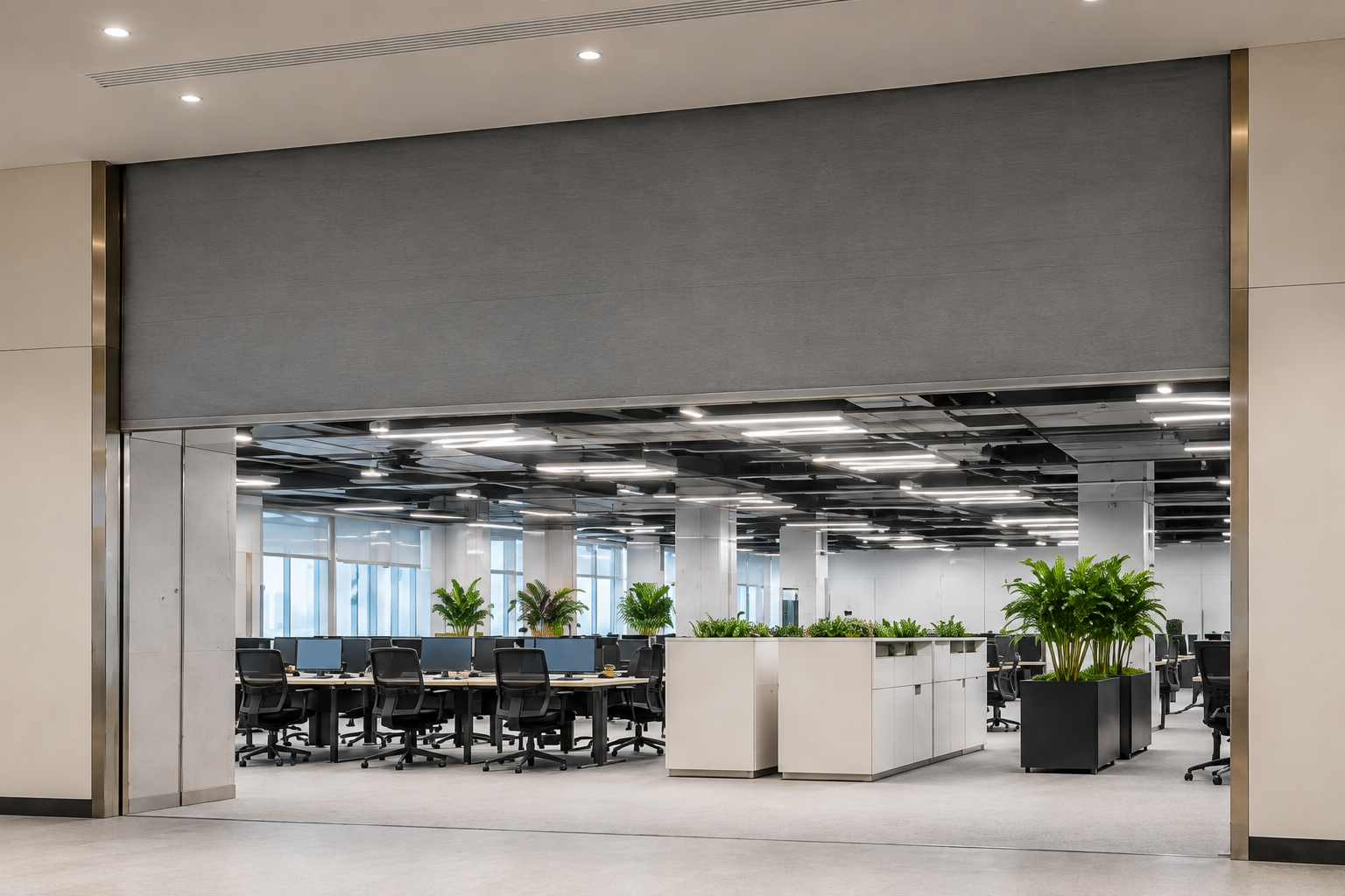 Fire curtain deployed across an open-plan commercial space