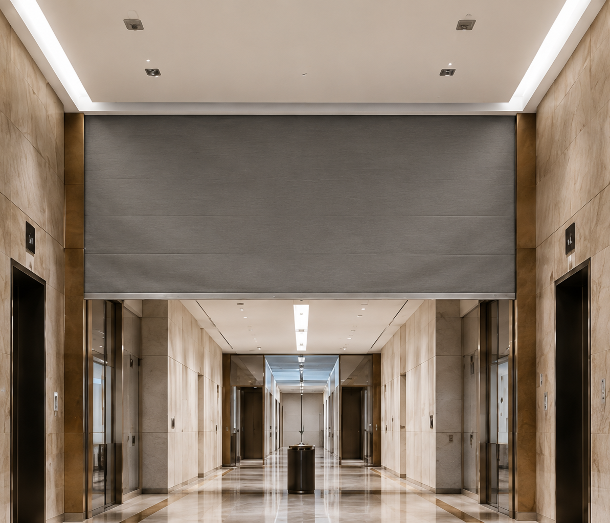 Fire curtain deployed in a modern high-rise lift lobby